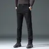 Pantalones de vestir forrados de polar para hombre para otoño e invierno, pantalones largos casuales gruesos de pierna recta color café, corte slim para uso en exteriores