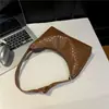 2025 Nova Casual Retrô Grande Capacidade Cor Sólida Moderna Elegante Simples Personalidade Ombro Único Axila Bolsa de Trabalho