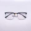 Venta al por mayor 9920, gafas de negocios informales para hombre, montura completa, montura de gafas de titanio semiligera, acero plástico, súper elásticas, resistentes, con patas para gafas.