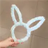 Venta caliente versión coreana diadema de orejas de conejo de peluche de 13 cm accesorios para el cabello tocado código QR de negocio de WeChat para promocionar el puesto pequeños regalos