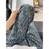 Jeans Masculino Primavera e Outono Novo Lavado Retro Azul Perna Curva Estampa Completa Jacquard Streetwear Americano Rebelde Bonito Calça Longa