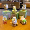 Adorno mecedor auténtico del Patito Liu para estaciones de trabajo de oficina, decoración para aliviar el estrés, lindo accesorio para la consola central del interior del coche
