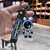 Llavero con colgante de astronauta y conejo estrellado para coche, creativo, para parejas, bolsa de regalo, regalos colgantes