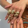 Europa e Estados Unidos transfronteiriço exagerado ins metal liso abraço anel aberto senso de design rosca geometria anel de dedo cruzado feminino