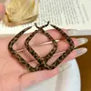 Pendientes Redondos Estampado de Leopardo con Acabado Afelpado para Mujer en Otoño e Invierno Diseño Único Elegante Europeo y Americano Joyería Pequeña para Orejas que Resalta el Rostro Exagerado
