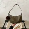 Bolso bandolera moderno y sencillo para el día a día, bolso de hombro casual único de nicho coreano, bolso tipo dumpling versátil de gamuza de moda