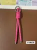 Llavero de cordón de cuero PU transfronterizo, colgante versátil para bolso, accesorios de decoración para botellas de agua y muñecas DIY, llaveros al por mayor