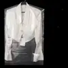 Loja de roupas em shopping center embalagem de roupas lavanderia transparente capa de poeira saco de poeira descartável capa de poeira para casaco terno