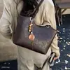 Bolso Tote simple estilo nuevo versátil otoño bolsa de gran capacidad para mujeres 2026 bolso de hombro para ir al trabajo moderno casual