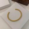Pulseira Aberta Trançada em Aço Titânio em Forma de C para Mulheres, Venda Quente Transfronteiriça, Ouro 18K, Não Desbota, Luxo Leve, Joias de Alta Qualidade no Atacado