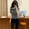 Elegante Camiseta de Punto Manga Corta Retorcida con Cuello Diagonal para Mujer Verano 2026 Nuevo Precioso Top Adelgazante que Cubre el Vientre