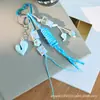 Encanto de Bolso Estilo Miu Dulce y Fresco Combinación de Colgantes Adornos Piezas Terminadas Accesorios Decoraciones para Mujer Llavero Colgante Decorativo Adorno