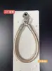 Nova pulseira de couro triangular com fivela dupla para celular, acessório universal, pulseira simples com fivela dupla, corrente de suspensão anti-queda