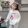 Camiseta de manga larga 100% algodón para niña para primavera y otoño 2026, elegante camiseta básica infantil con estampado de dibujos animados para niñas pequeñas