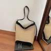Bolso de Axila para Mujer 2026 Verano Nueva Moda Versátil Bolso de Playa Tejido Popular de Alto Valor Bolso Cubo de Paja