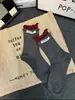 Calcetines Ancora Red de Productos Europeos de Lujo Ligero de Moda Nuevo Estilo Coreano Calcetines de Longitud Media a Juego Etiqueta de Tela Letra mm Oreja de Madera Calcetines para Mujer
