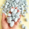 Pintura de piedras sobre fondo blanco, piedras pintadas, piedras pintadas a mano sobre un fondo blanco, kit de materiales para pintura de piedras hechas a mano DIY