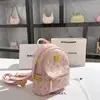 Entrega en una sola pieza popular mochila rosa de gran capacidad 2024 moda de alta calidad remache mochila pequeña venta al por mayor