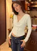 Camiseta corta ajustada de manga corta con hombros descubiertos de estilo europeo y americano para mujer, nueva moda de verano 2026, top de manga larga para chica popular