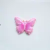 Serie de mariposas de colores con emulación de caras brillantes de dibujos animados, accesorios de resina para hacer tú mismo, horquillas para el pelo, carcasas para teléfono móvil, joyas, pegatinas para refrigerador