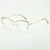 Nuevas gafas versátiles estilo europeo y americano anti-luz azul con pedrería, montura de metal, moda femenina ojo de gato personalidad de moda gafas sin graduación