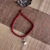 Entrega en Vivo de Cadena para Teléfono Móvil Cinabrio Flor de Loto Bajo Contenido Estilo Muñeca Exquisita para Mujer Año del Zodiaco Hombres Arena Púrpura Dorada Colgante para Teléfono Móvil