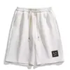 Shorts de Verão Masculino 2026 Novo Primavera Estampa de Letras Shorts de Comprimento Médio Versátil Shorts de Cinco Pontos Calças Casuais Respiráveis de Quatro Pontos