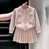 Conjunto de dos piezas de punto dulce color rosa con lazo para niñas, nuevo para otoño 2026, estilo coreano