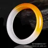 Novo bracelete de rocha de quartzo Jade semi-branco semi-amarelo Bracelete de jade Dragão Amarelo Bracelete de seda amarela Jade dourado de Xinjiang atacado