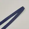 Correa plana de cuadrícula cuadrada de 1 cm de colores en stock, correa de hombro de felpa antideslizante de un solo lado, banda elástica de poliéster cepillado para ropa interior