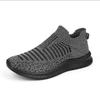Tênis casual tecelagem flyknit masculino sola macia respirável macio tênis de corrida um pedal sapatos de coco comércio exterior cross-border tênis atacado