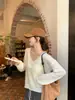 Impresionante Conjunto de Dos Piezas para Mujer: Cárdigan de Punto Hueco Superpuesto con un Chaleco, Estilo Coreano para Principios de Otoño, Top Elegante y Adelgazante
