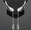 Comercio Exterior aretes de moda europeos y americanos alas de ángel taladro brillante clip para oreja cadena de cristal borla joya para oreja