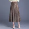 Falda plisada de malla a cuadros para mujer, nuevo estilo otoño/invierno 2026, que cubre la cadera, de longitud media, corte ajustado, línea A, falda con dobladillo ancho
