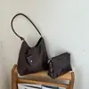 Bolsa de alta qualidade com padrão trançado vintage para mulheres, nova moda 2026 bolsa de ombro para o dia a dia, bolsa balde de mão de grande capacidade