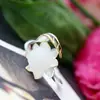 Nafoge joyería de plata al por mayor incrustada con Loto de Jade Hetian natural anillo femenino de plata de ley 925 anillo abierto retro de plata de ley