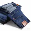 Jeans Finos Masculinos em Estoque para Venda Direta de Verão, Corte Reto Solto, Elástico, Casual, Cintura Média, Versátil, Resistente ao Desgaste