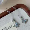 Pendientes Largos de Borla de Perla Mariposa Azul con un Ambiente Súper Hada Fresco y Sencillo, Estilo de Lujo Ligero, Adecuados para Rostros Cuadrados y Redondos, Pendientes de Diamante Brillantes