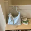 Bolso casual de nicho estilo coreano, nuevo bolso tote de moda verano 2026, alta apariencia, bolso de hombro de gran capacidad para ir al trabajo