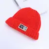Gorros de punto para niños más vendidos transfronterizos con banda elástica, gorros de invierno para exteriores a prueba de viento y resistentes al frío, disponibles para venta al por mayor