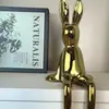 Venta al por mayor Lujo Ligero de Alta Gama Creativo Cerámica Conejo Sentado Conejo de Orejas Largas Adornos Sala de Estar Estudio Mueble de TV Decoraciones para el Hogar
