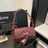 Bolso tejido de PU de moda para mujer, nuevo estilo 2026, bolso de hombro de moda, bolso de hombro simple y casual, bolso elegante para el día a día