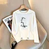 Bestseller de Almacén Lightning Marca de Moda Camiseta de Manga Larga para Mujer 2026 Otoño Invierno Holgada Gato Versátil Top de Pareja Transfronterizo Comercio Exterior