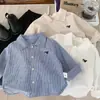 Camisa de otoño para niño 2026 nuevo estilo camisa de algodón puro para primavera y otoño niños 2-3 años top de otoño moderno para niño