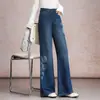 Pantalones acampanados de mezclilla versátiles con estampado retro de moda para mujer, nuevos pantalones casuales de cintura alta adelgazantes para otoño 2026