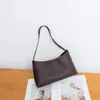 Bolsa feminina simples, novo modelo 2026, grande capacidade, adequada para o trabalho e uso casual, estilo vintage, bolsa de ombro para o dia a dia com um design de qualidade
