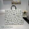 Bolsa No Tejida Recubierta de Película Verano Cuadriciclo Aire Acondicionado Cuadriciclo Empaque de Cuatro Piezas Textil para el Hogar Esterilla de Verano Bolso de Mano Bolso de Mano Bolsa de Compras