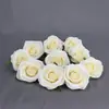 Fabricantes de cabeças de flor de rosa artificial decoração de casamento casa artificial com arame de ferro cabeça de flor de rosa grande flor de simulação flor artificial fotografia