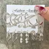 Set de pendientes de perla retorcida dorada estilo europeo y americano, pendientes metálicos geométricos en forma de C, pendientes para mujer de alta gama y únicos