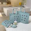 Bolsa Tote de TNT Espessada com Botão de Pressão, Logo Personalizável, Grande Capacidade, Ecológica, Adequada para Lojas de Roupas Femininas e Lojas de Vestuário